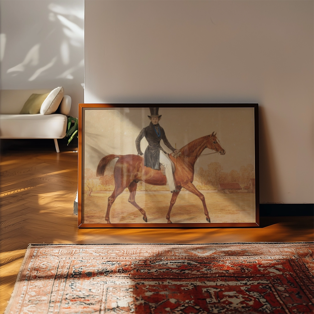 Framed painting of a gentleman in a top hat riding a brown horse, displayed on a wooden floor with a Persian rug and a modern sofa in the background.