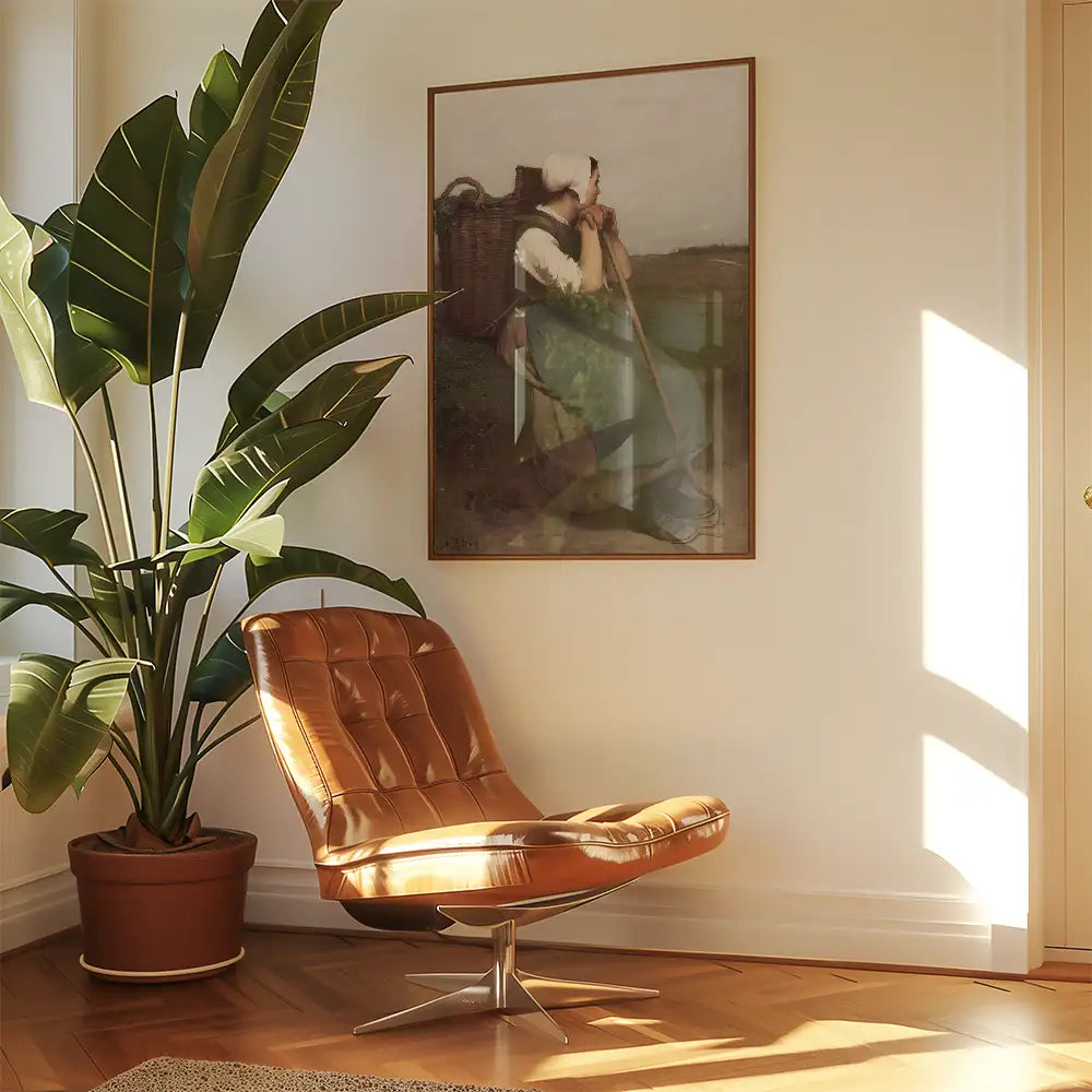 Painting of a woman with a basket in a serene landscape, displayed above a stylish brown chair next to a large potted plant in a sunlit room.