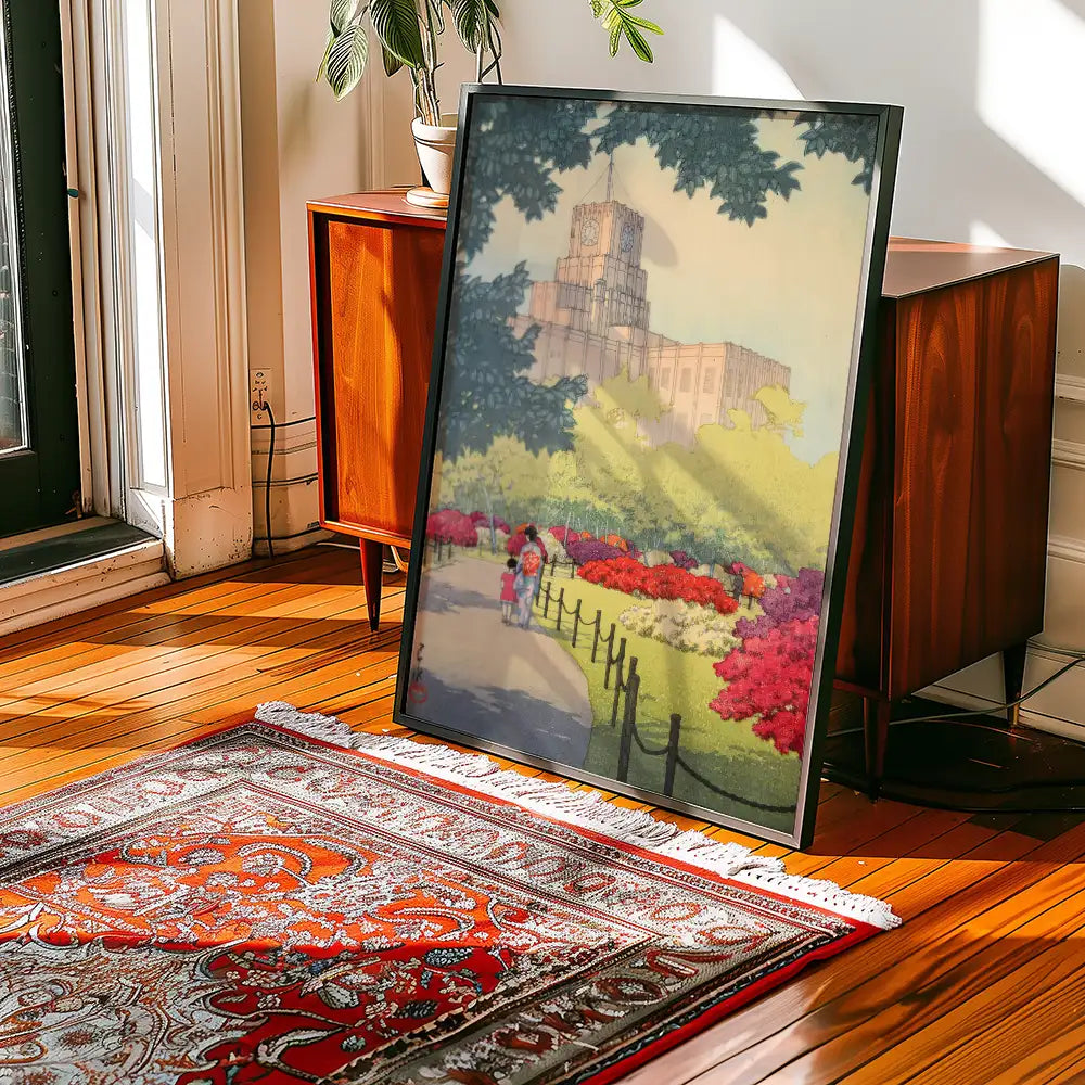 Framed painting of a serene park scene with vibrant flowers and a path, displayed indoors near a wooden cabinet and an ornate rug.