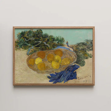 Painting of a basket filled with oranges, accompanied by blue gloves, set against a light background with greenery.