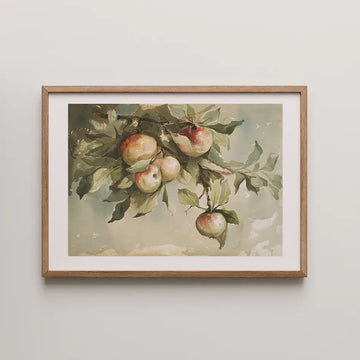 Framed watercolor painting of apple branches with ripe and unripe apples, set against a soft, muted background.