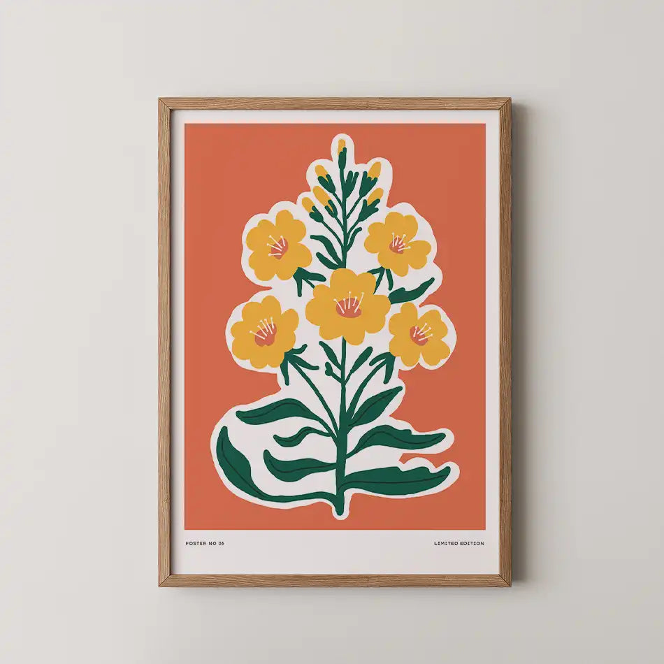 "Golden Wildflowers art print from Aesthetic Collection featuring vibrant yellow flowers against a coral-orange background, framed in a modern wood frame with limited edition typography."