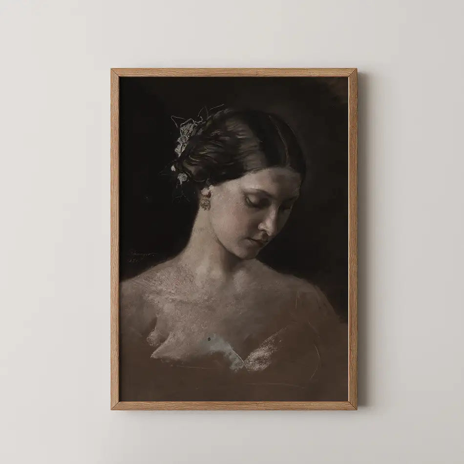Framed painting of a woman in soft light with a dark background