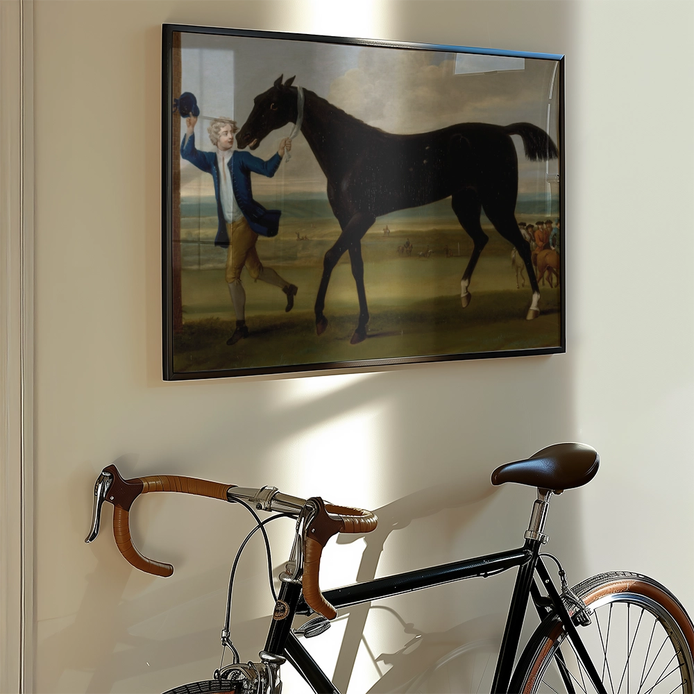A painting of a man in a blue coat holding a hat while leading a horse, displayed on a wall next to a bicycle.