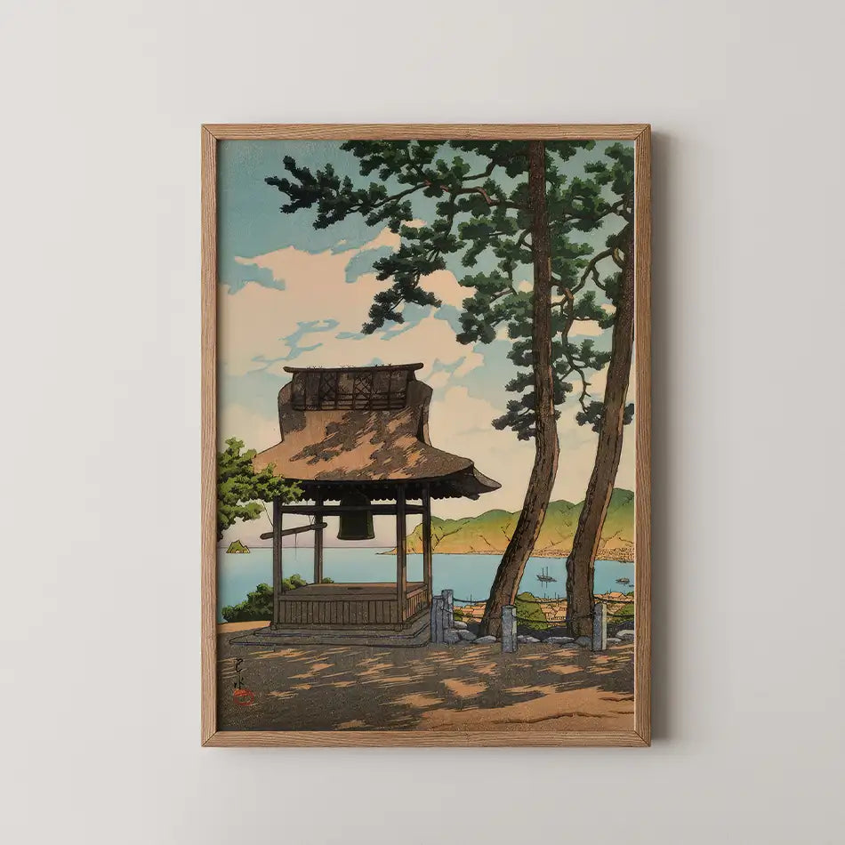 Painting of a traditional Japanese gazebo overlooking a serene coastal landscape, framed in wood.