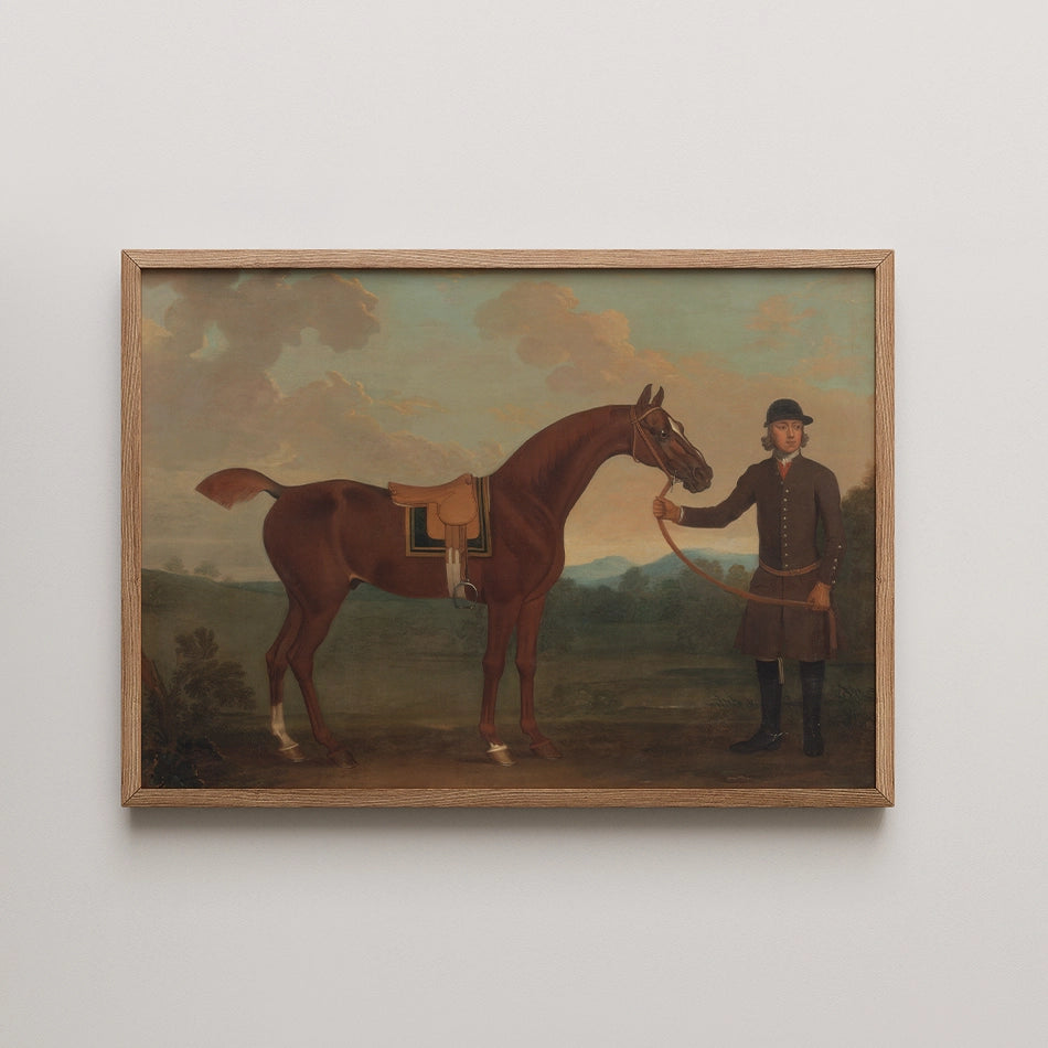 Painting of a brown horse standing next to a man in historical clothing, framed in wood, set against a landscape background with clouds.