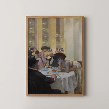 Painting of a social gathering in a restaurant, featuring elegantly dressed individuals, a table with food, and a woman in a white dress leaning over the table, framed in wood.