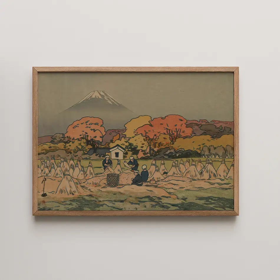 Framed painting of a rural landscape featuring harvesters, autumn trees, and Mount Fuji in the background.