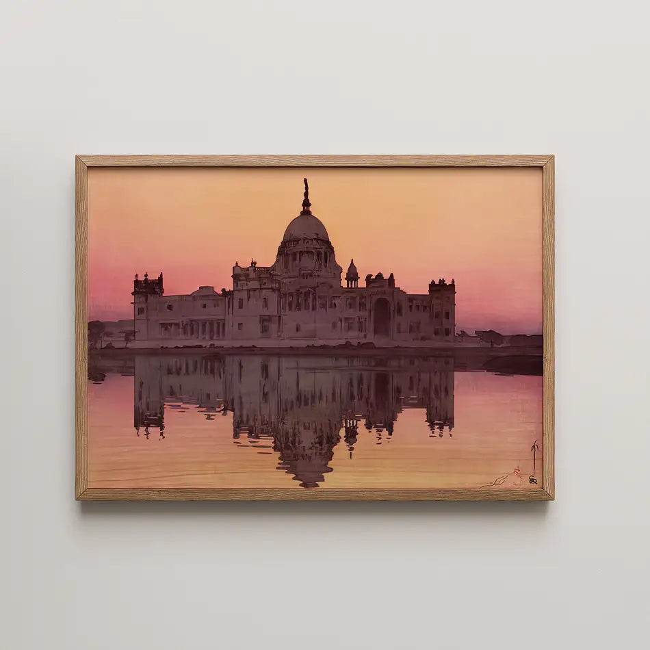 Painting of a historic building silhouetted against a pink and orange sunset, framed in wood, with its reflection in water.