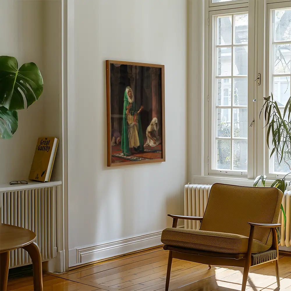 Painting of a woman in a green dress with a dog, hanging on a white wall in a cozy room with a chair and plants.