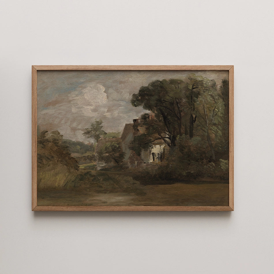 Painting of a countryside landscape featuring a house among trees, framed in light wood.