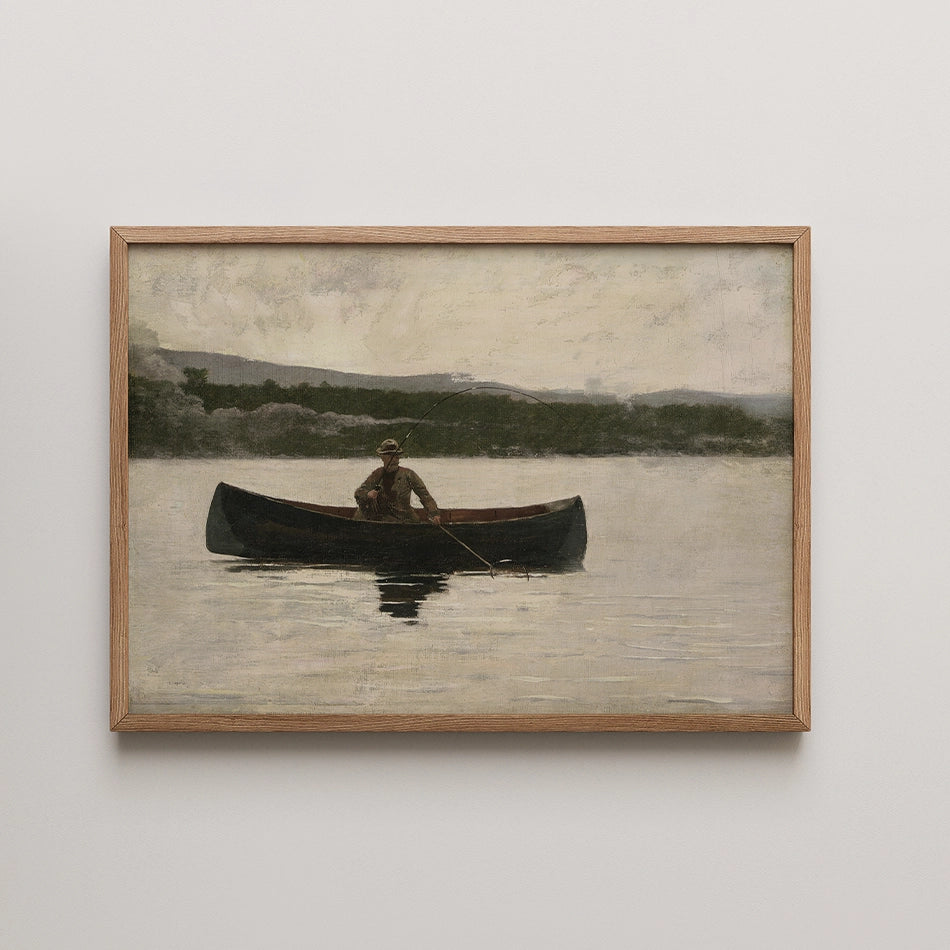 A tranquil painting of a fisherman in a small boat on still water, framed in natural wood, surrounded by a serene landscape.