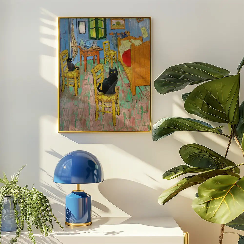 Painting of a room with yellow chairs and black cats, displayed on a wall beside a blue lamp and green plants.