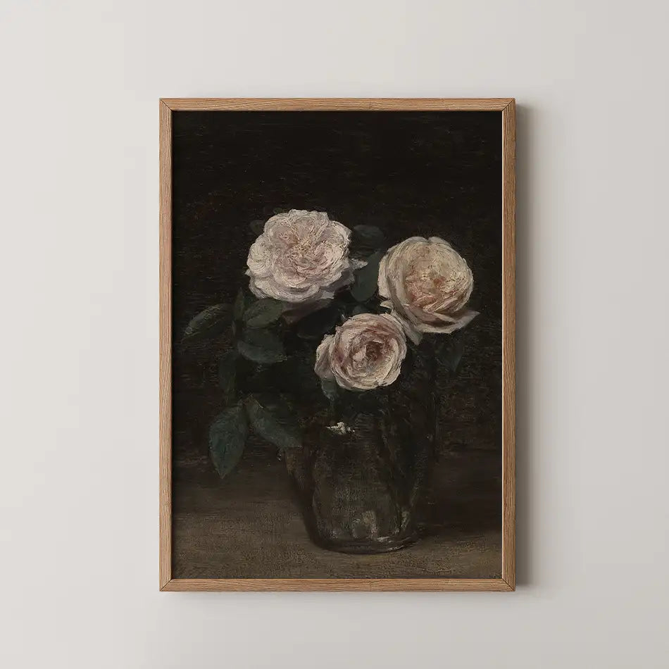 Framed painting of three pale pink roses in a glass vase against a dark background.