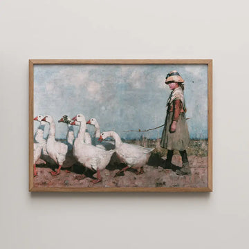 Painting of a young girl walking with a group of white geese against a cloudy sky, framed in natural wood.