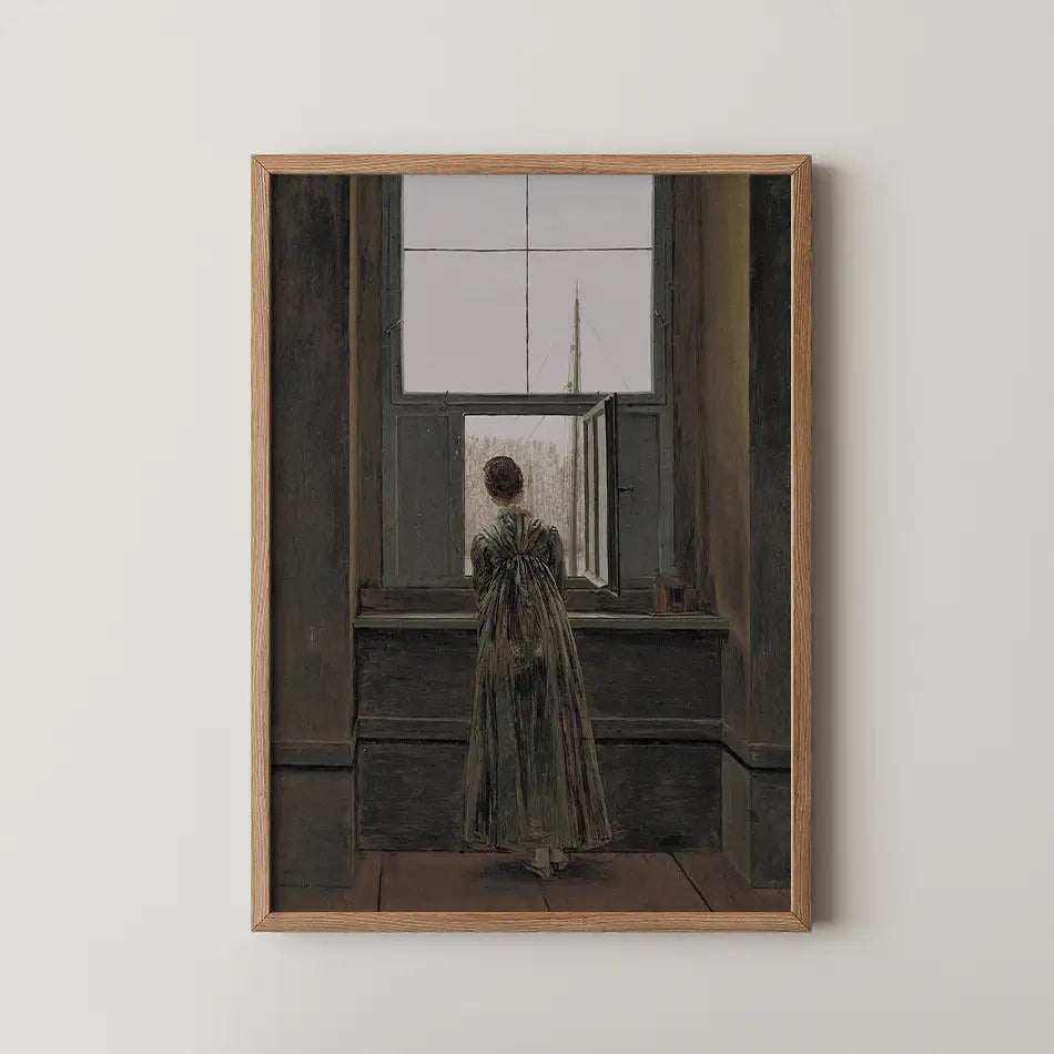 Painting of a woman in a long dress standing by an open window, gazing outside. Framed in wood.