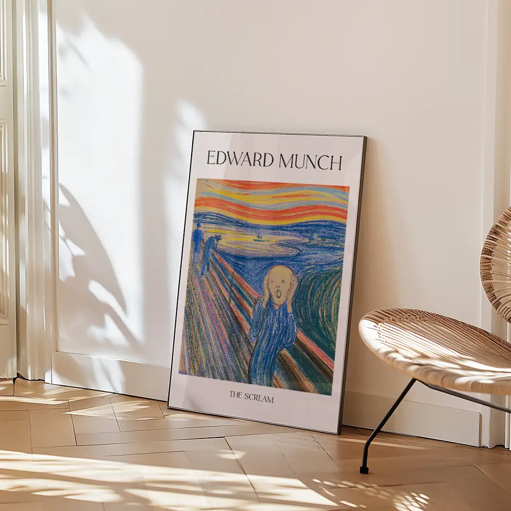 Framed poster of "The Scream" by Edward Munch leaning against a wall in a stylish interior setting.