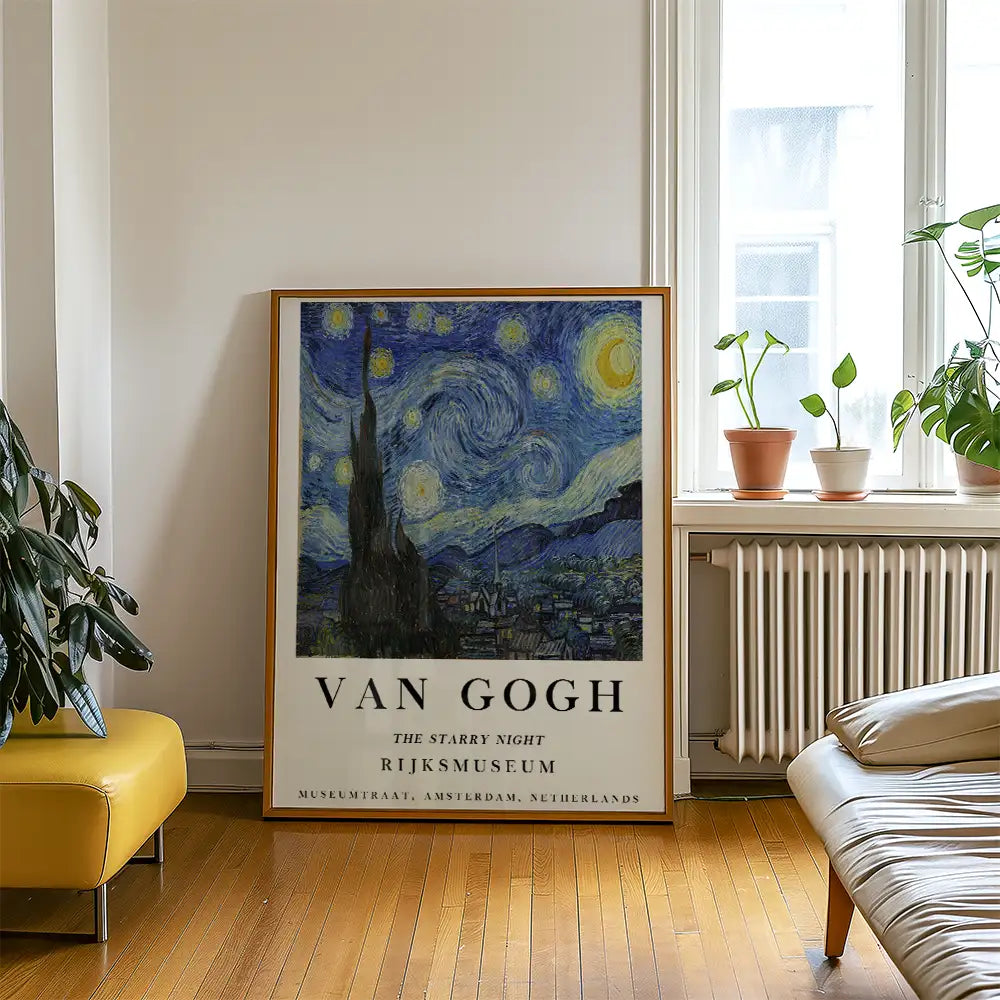 A framed poster of Van Gogh's "The Starry Night," displayed in a bright room with indoor plants and a yellow chair.