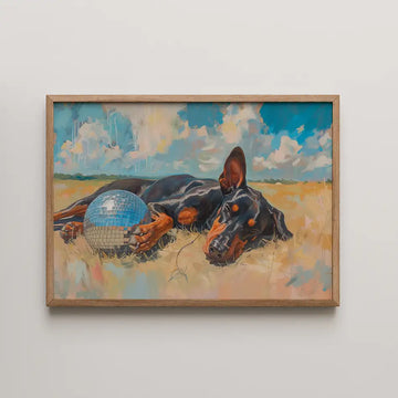 Whimsical pet art print featuring a relaxed Doberman lounging in a sunlit field beside a disco ball, surrounded by pastel clouds and golden grasses.