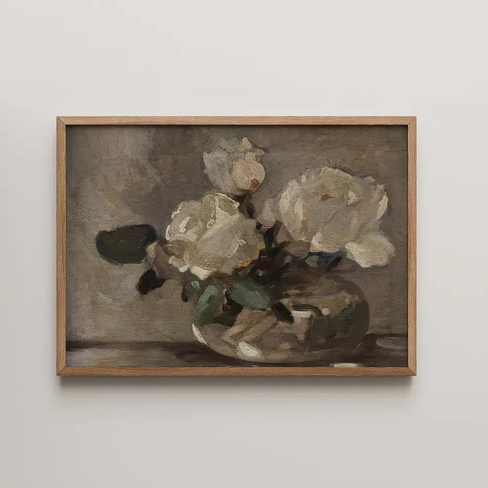 A framed oil painting featuring white roses in a glass vase against a muted background.