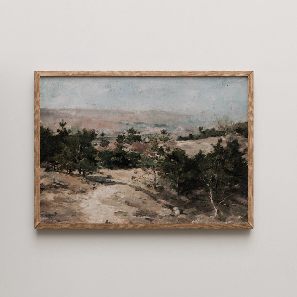 Landscape painting featuring a serene view of trees and a winding path framed in natural wood.
