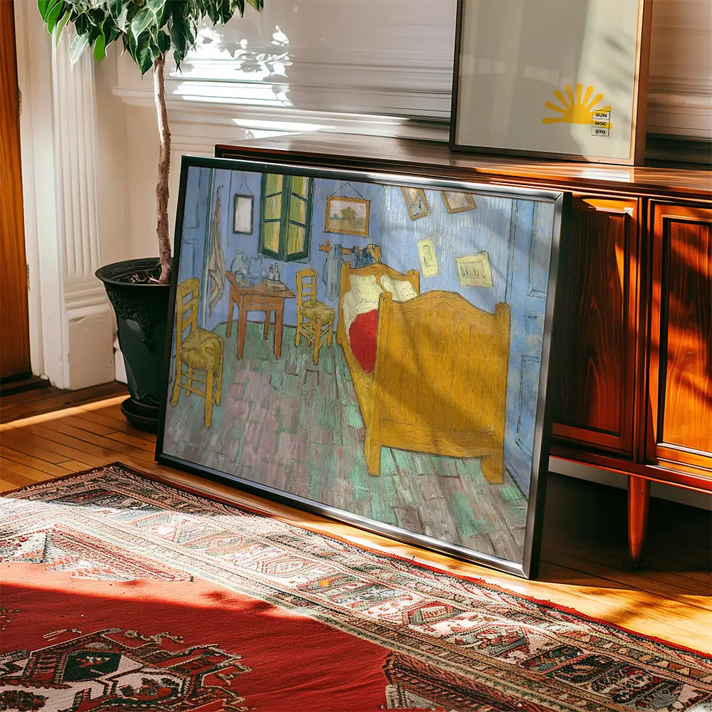 Painting of a cozy bedroom interior featuring a bed, chairs, and a table, displayed in a stylish living space with wooden furniture and a decorative rug.