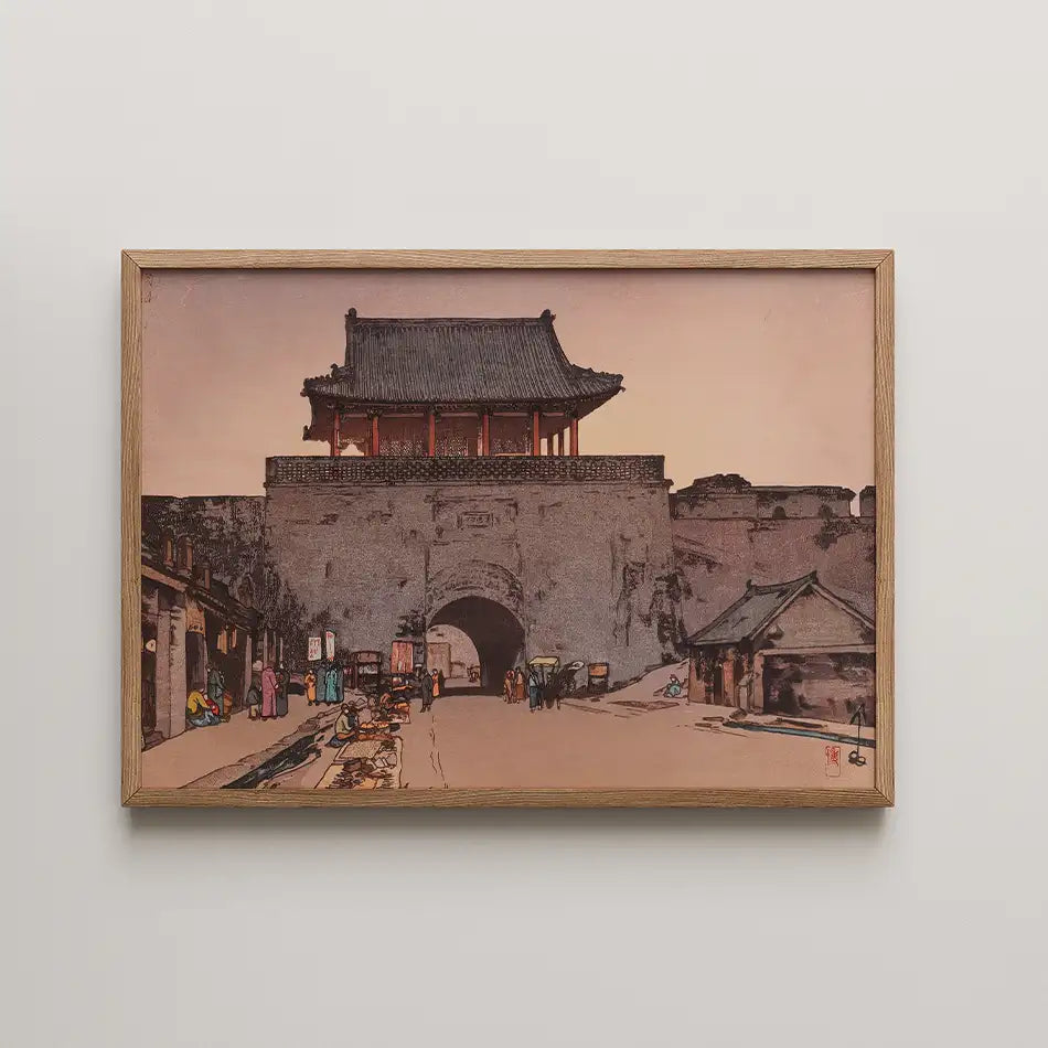 Framed painting of a traditional Asian city gate with people and market scenes in the foreground, featuring warm tones and detailed architecture.