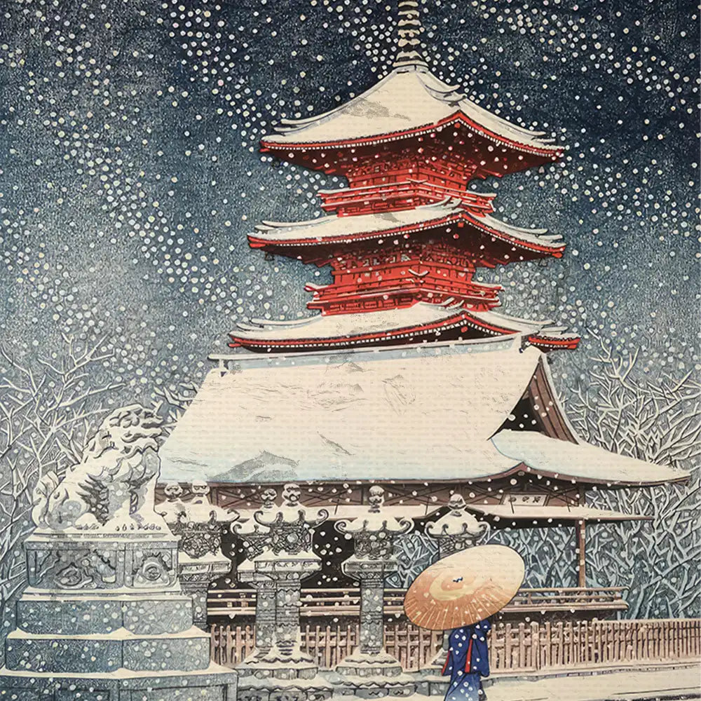 Snowy scene featuring a traditional Japanese pagoda with a person in a blue kimono and straw hat walking near stone lanterns and sculptures.