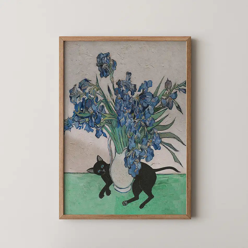 Black cat near a vase of blue irises in a framed painting on a wall.