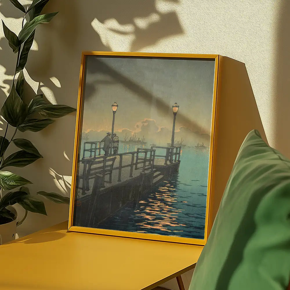 Painting of a serene pier at dusk, featuring lampposts and shimmering water reflections, framed in yellow, with greenery in the background.