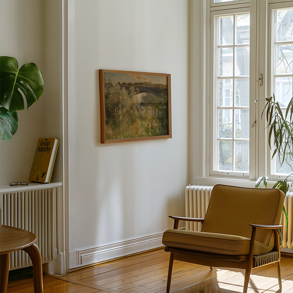 A framed painting on a wall in a bright room with a green plant, wooden chair, and a book titled "The Great Gatsby" on a shelf.