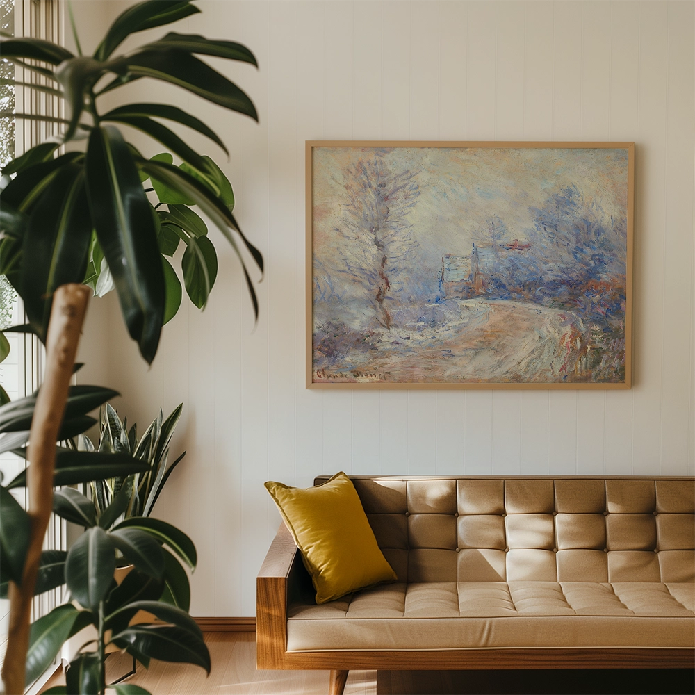 A serene landscape painting featuring a pathway surrounded by trees, framed and displayed above a stylish brown sofa with a yellow cushion in a modern interior setting.