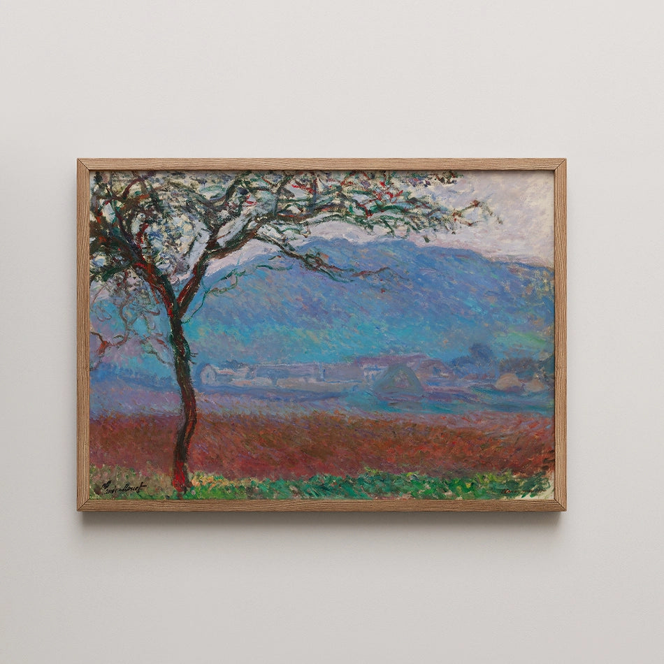 Landscape painting featuring a tree in the foreground, with rolling hills and a colorful sky in the background, framed in a light wood frame.