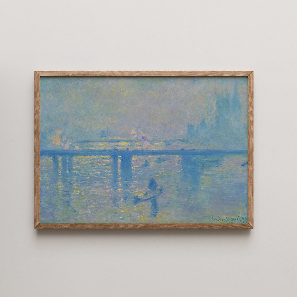 Painting of a serene water scene with soft blue hues and reflections, framed in light wood.