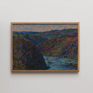 Painting of a river flowing through hilly terrain, framed in wood, showcasing vibrant colors and natural scenery.