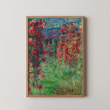 Vibrant impressionist painting featuring lush greenery and blooming red flowers in a wooden frame