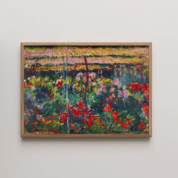 Framed painting of a vibrant garden with red and pink flowers under a thatched roof.