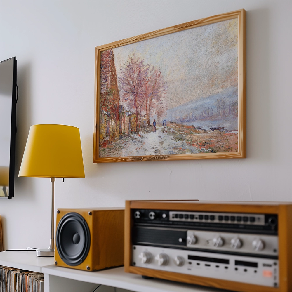 A framed painting of a serene landscape with pink trees, displayed on a wall above a modern yellow lamp and vintage audio equipment.