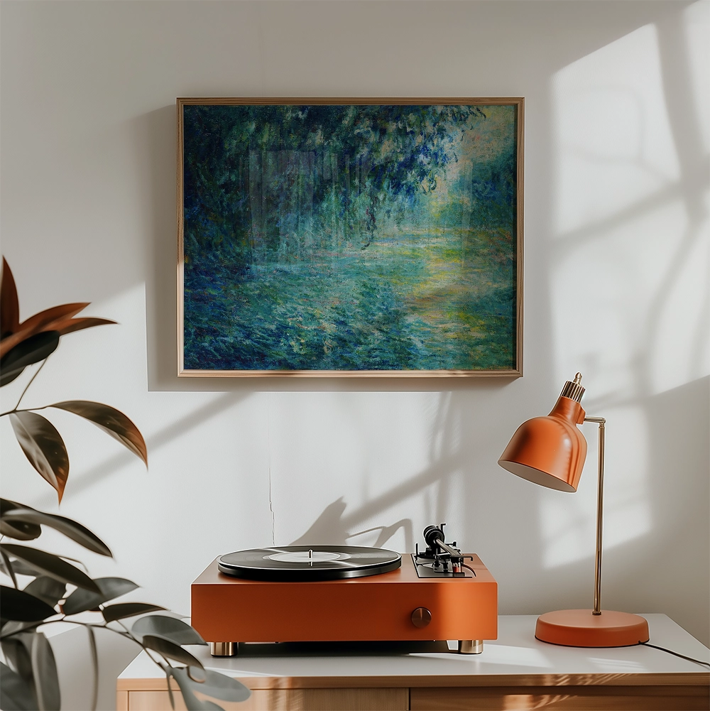 Framed painting of a serene landscape in shades of blue and green, displayed above a vibrant orange turntable and lamp in a modern interior setting.