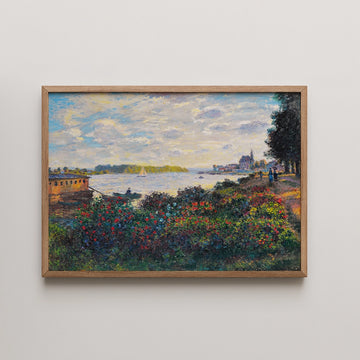 Framed painting depicting a scenic riverside landscape with colorful flowers, a boat on the water, and a distant town under a cloudy sky.