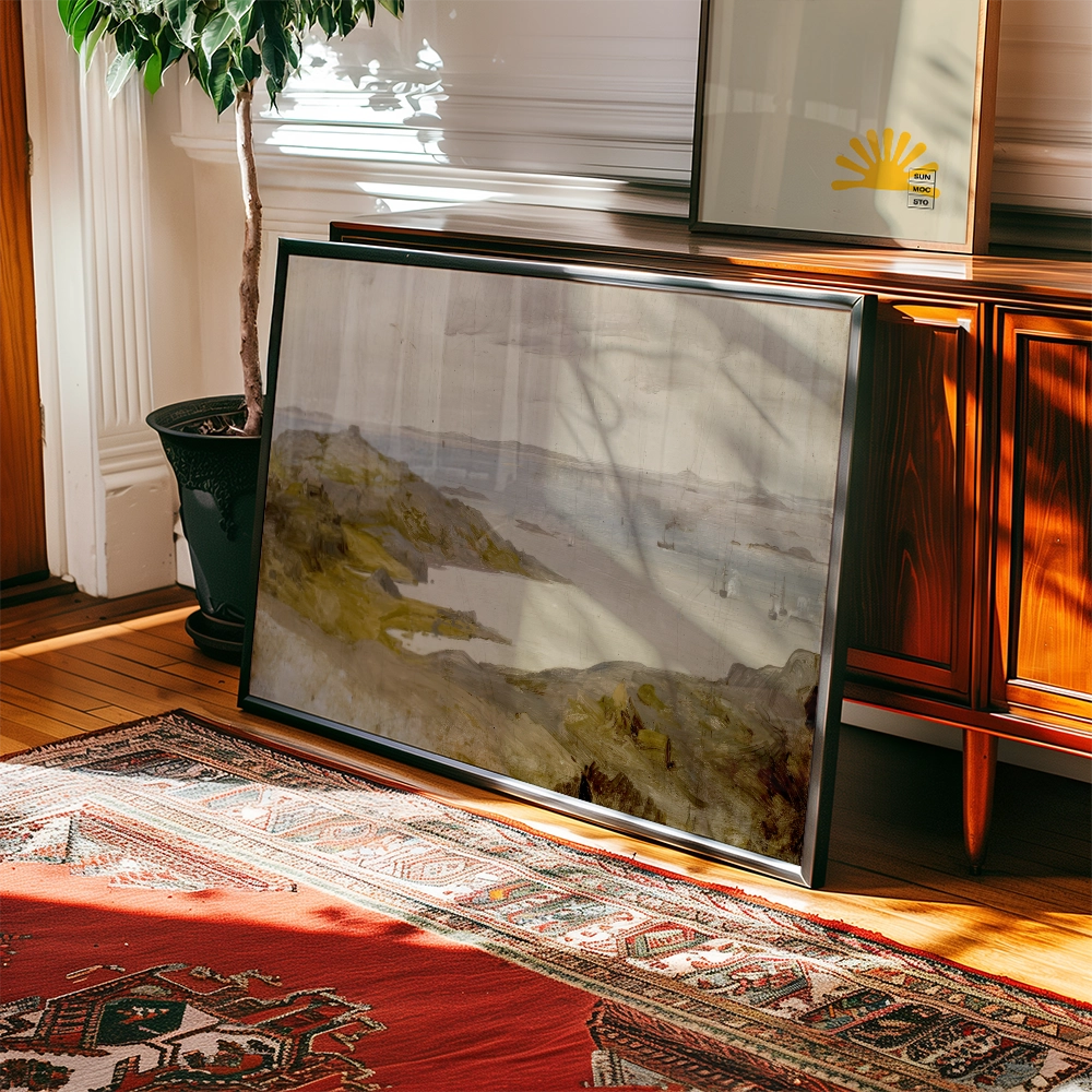 Painting of a serene coastal landscape leaning against a wooden console table, with natural light casting shadows in a warm room setting.