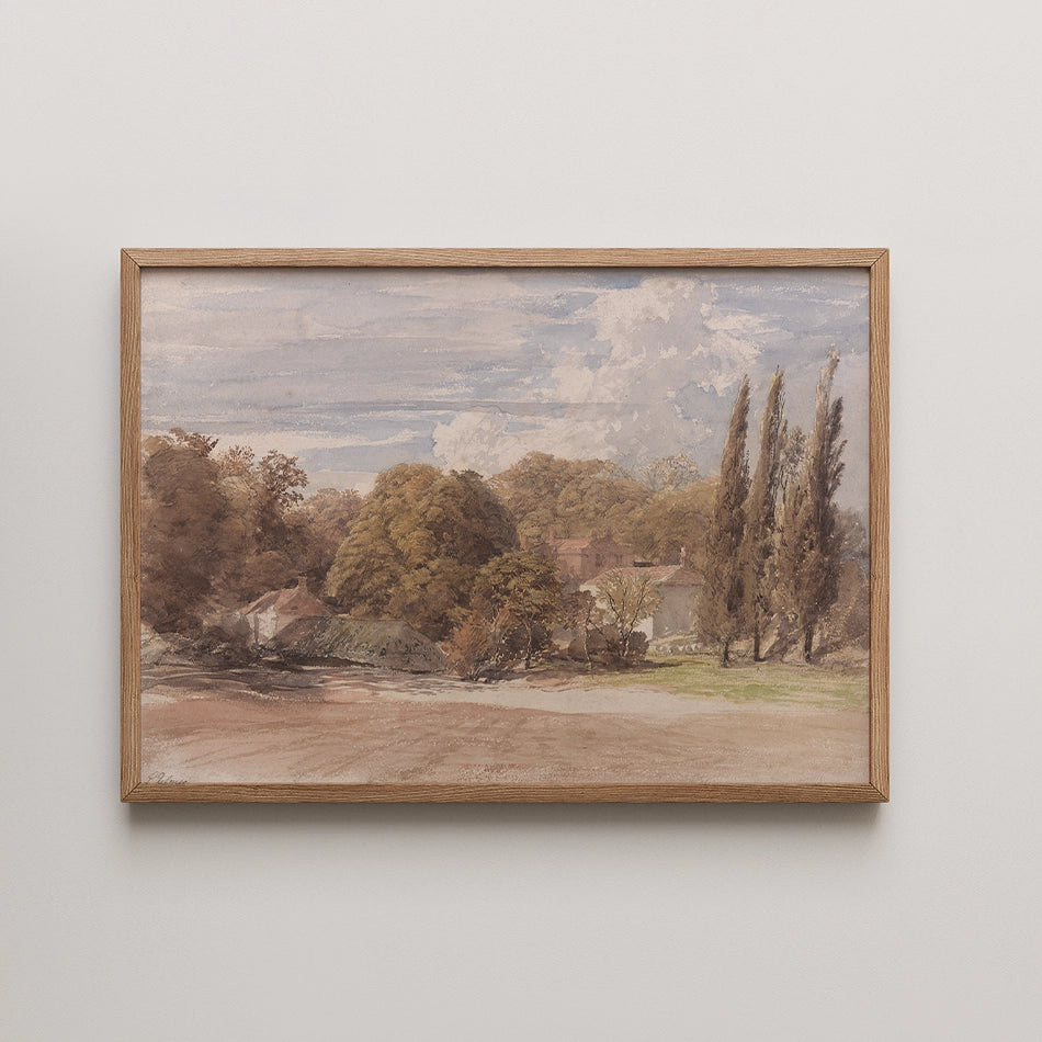 Framed landscape painting featuring trees and a clouded sky in soft watercolor tones.