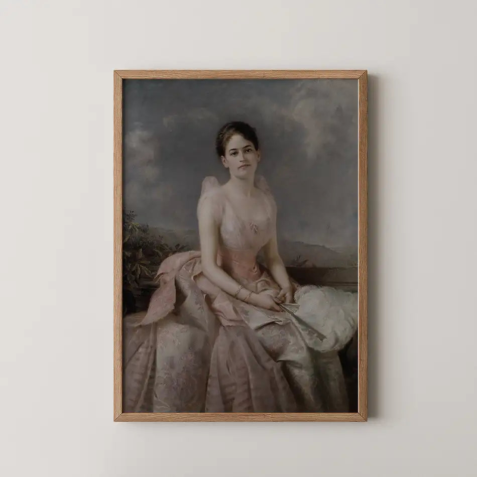 Portrait of a woman in an elegant pink dress, seated with a serene expression, framed in a wooden frame hanging on a wall.