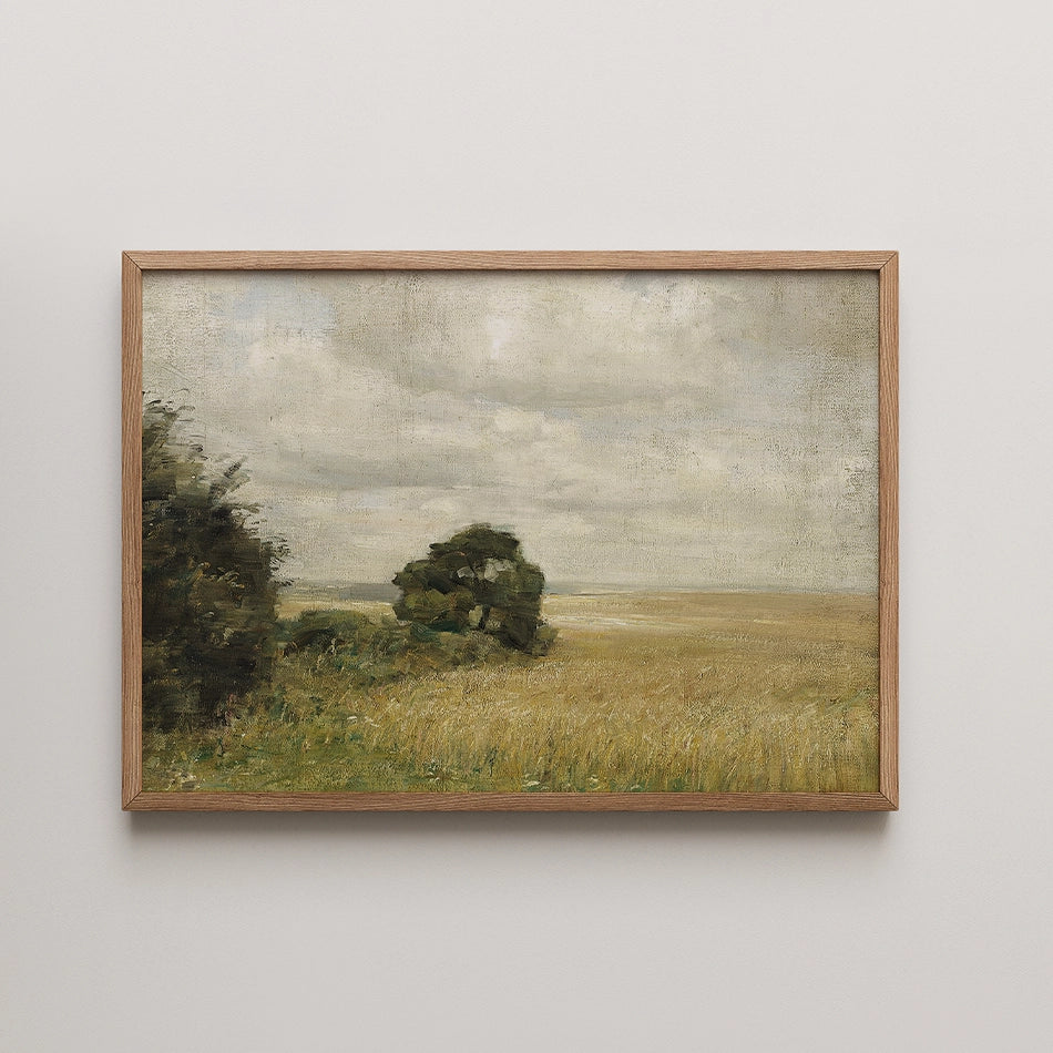 Painting of a serene landscape featuring a grassy field and distant hills, framed in natural wood.