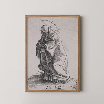 A framed black and white artwork depicting a draped figure with a halo, dated 1520, displayed on a white wall.
