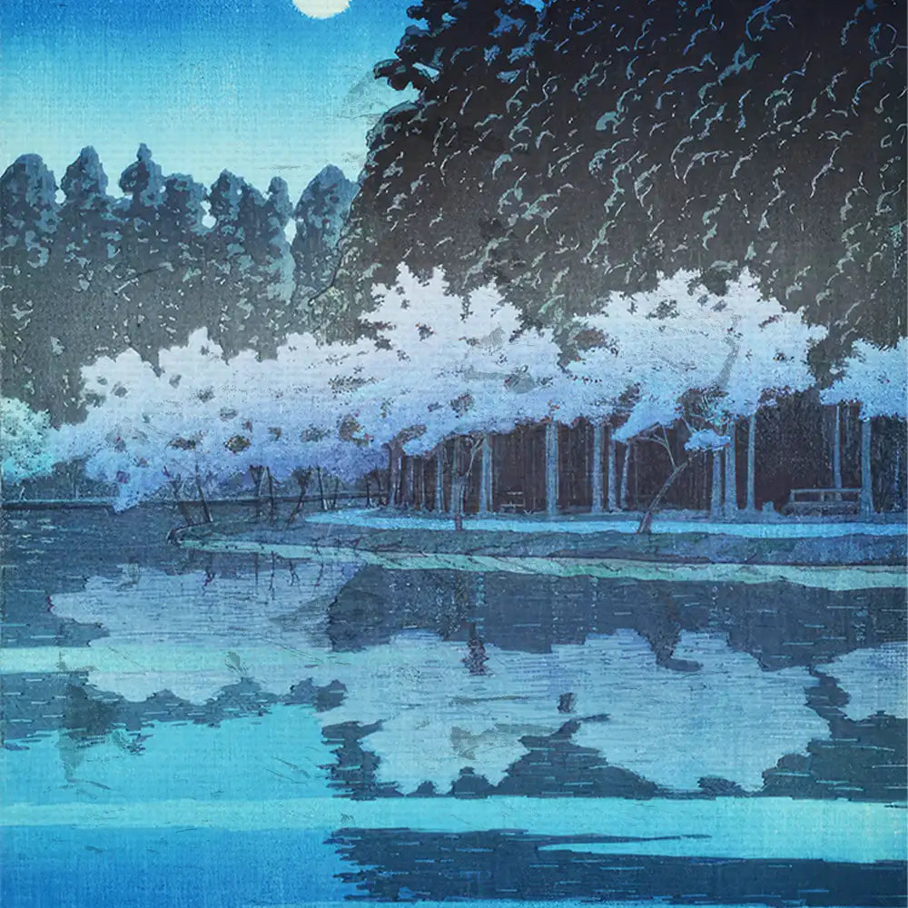 A serene blue landscape painting featuring cherry blossom trees reflected in calm water under a moonlit sky.
