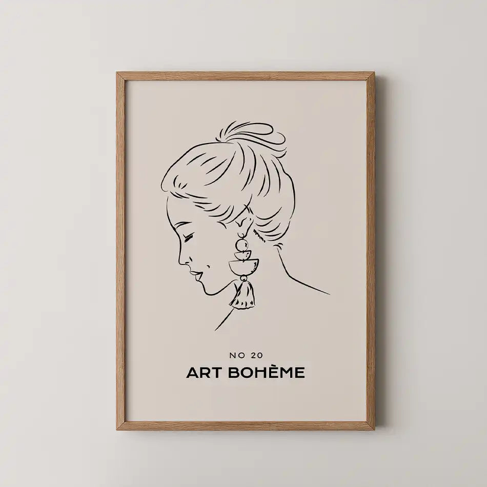 Elegant minimalist portrait art print featuring a woman in profile wearing a bohemian earring with tassel on a soft beige backdrop, framed in wood, part of the Line Art Collection."
