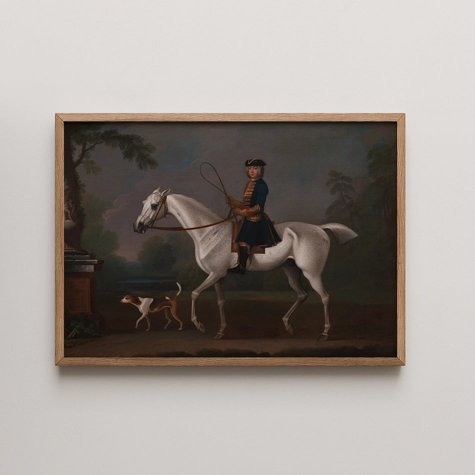 Painting of a rider in historical attire on a white horse, accompanied by a small dog, framed in wood.