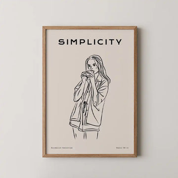 Elegant line art illustration of a woman enjoying a casual bite, framed in wood, with the word 'SIMPLICITY' in bold typography and a soft beige background, representing modern decor"