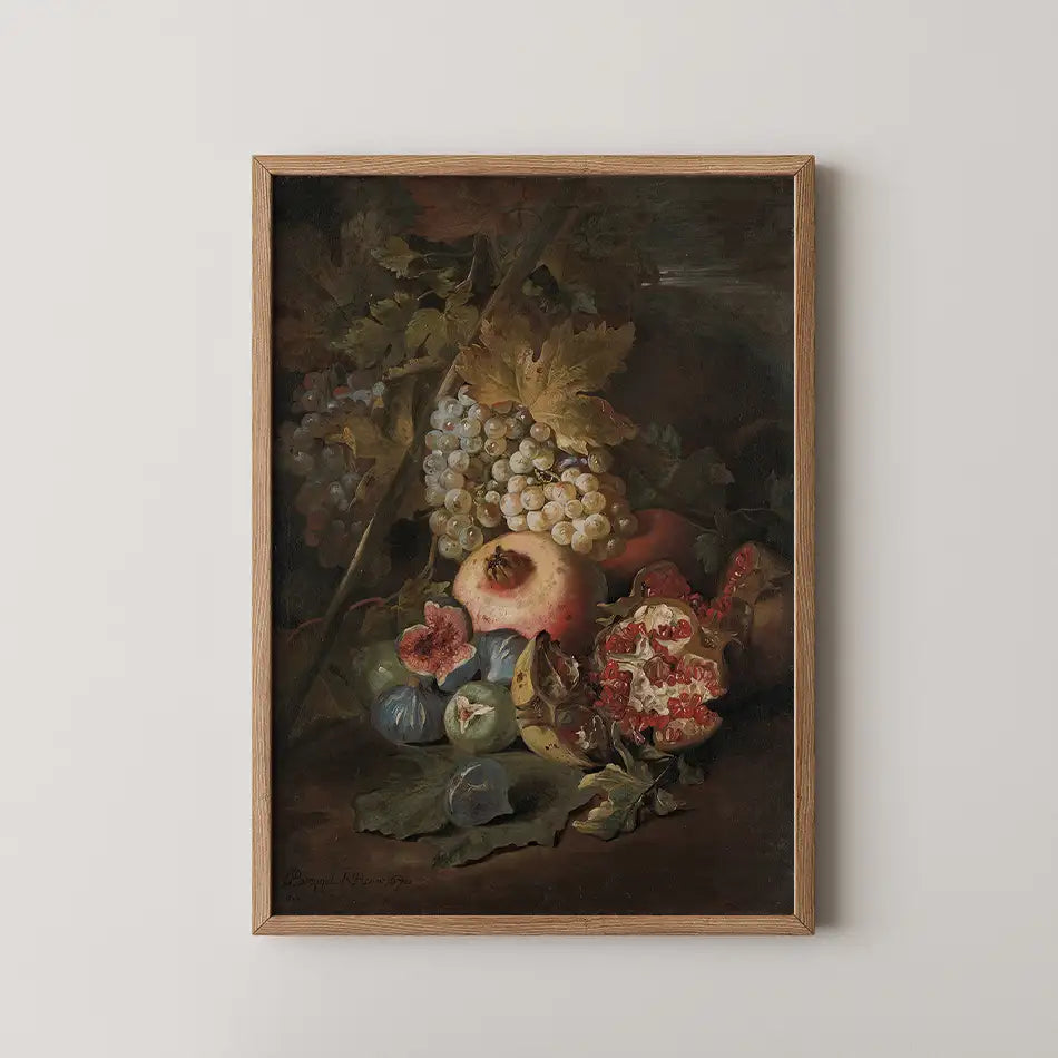 Still life painting of assorted fruits including grapes, apples, figs, and pomegranates in a wooden frame.